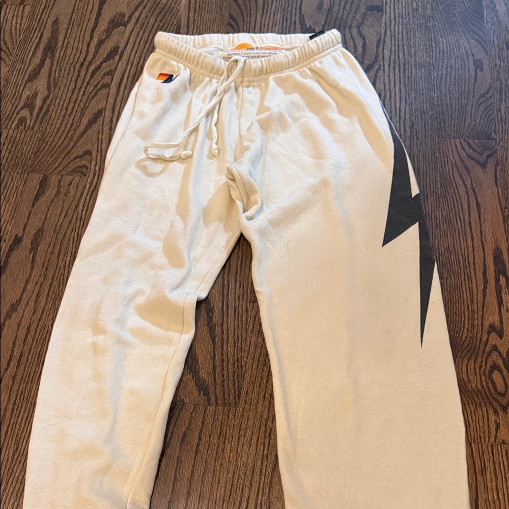 Aviator Nation Cream Drawstring Sweatpants with Black Lightning Graphic